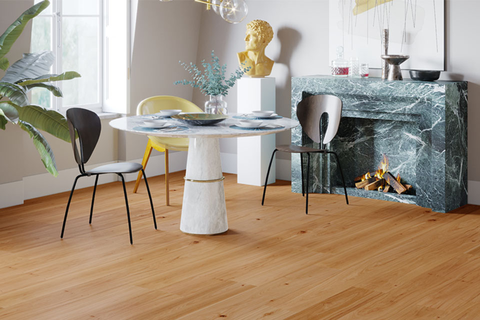 wood floor yellow accents and stone fireplace